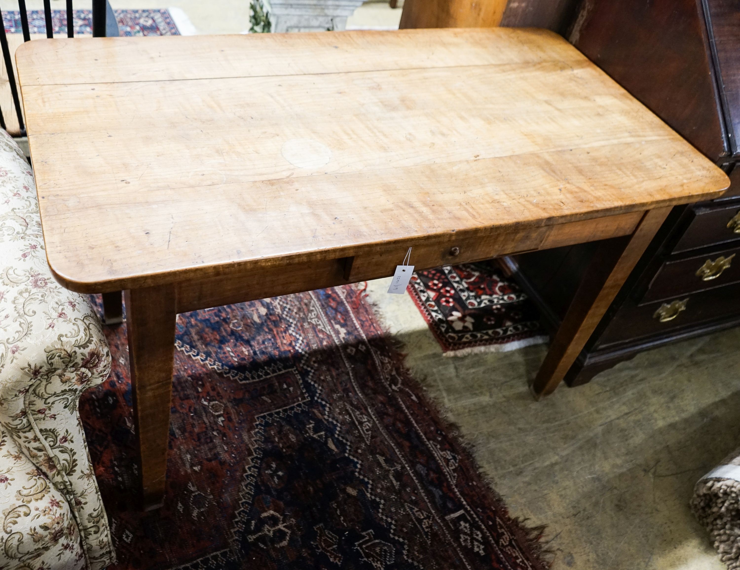 A 19th century French fruitwood and cherry farmhouse side table, width 130cm, depth 69cm, height 76cm